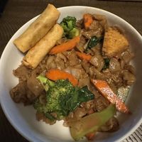 Pad See You with Tofu and a side of Crispy Rolls. So yummy and well seasoned, not too spicy but very flavorful  at BOONNOON Market in Arlington
