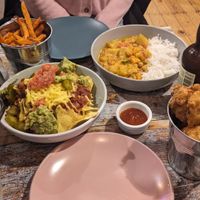 All gluten free L-R  - nachos, sweet potato fries, mago curry and popcorn cauliflower. at The Good Grub in Eastbourne
