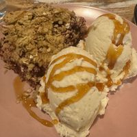 Berry crumble with ice cream (vegan)   at The Good Grub in Eastbourne