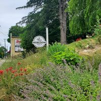entry sign at Heirloom Food Company in Danielson