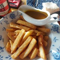 Chips and curry sauce at The Oxted Inn - JD Wetherspoon in Oxted