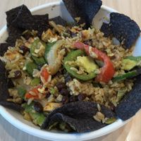 Veganized Fiesta Bowl (sub tofu for chicken and omit queso fresco). Good, tasty and filling. at Crisp & Green in Chanhassen
