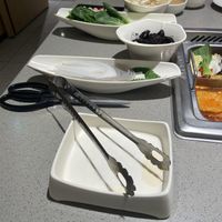 A few of the veggies and noodles we ordered, the others are already in the broth cooking 🤪  at Haidilao - Hongik University in Seoul