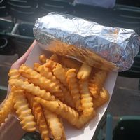 Big Dawg (in foil) and Slut Fries at Slutty Vegan - Truist Park Kiosk in Atlanta