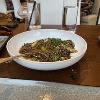Charred scallion noodles   at ORO Restaurant & Lounge in Raleigh