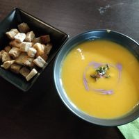 Starter: pumpkin/coconut soup with croutons at Nom Nom in Bucharest