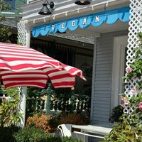 A charming front porch seating area.  at Dale and Dollops in Ocean Grove