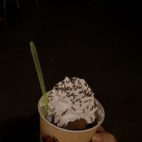 A kids portion of chocolate ice cream with vegan whipped cream at Kiez & Kugel in Berlin