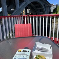 Balcony seating with Pacific Toast on bagel  at Whale Bites Cafe in Depoe Bay