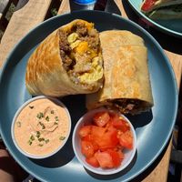 Breakfast burrito, tomatoes on the side at Whale Bites Cafe in Depoe Bay