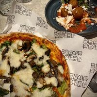 Mushroom pizza and arancini balls  at Belair Hotel in Blackwood