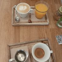 Café amb llet + americà+ Suc de taronja at botànic in Barcelona