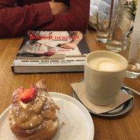 Favorite pastry ❤️ and a cool book we discovered in the cafe   at botànic in Barcelona