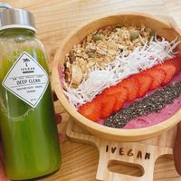 Celery juice & pink up smoothie bowl  at IVEGAN SUPERSHOP BEN THANH - Healthy Plant Based Cafe in Ho Chi Minh City