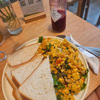 Scrambled tofu and juice at IVEGAN SUPERSHOP BEN THANH - Healthy Plant Based Cafe in Ho Chi Minh City