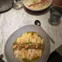 Leeks in vinaigrette with kimchi cream & Ravioli with crispy kale and hazelnut  at La Huerta Funky Castizo in Madrid