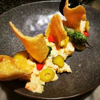 Ensaladilla rusa (the small or big one? We ordered small one and we had to pay the large). Don't know if it was a mistake or not... at La Huerta Funky Castizo in Madrid