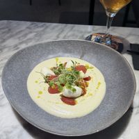 Ajoblanco de aguacate, tomates macerados y piparra en texturas  at La Huerta Funky Castizo in Madrid