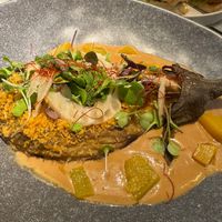 ROASTED AUBERGINE, SATAY SAUCE, PONZU GEL, AND HOMEMADE PICKLES. at La Huerta Funky Castizo in Madrid