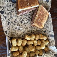 Vegan patty melt with tater tots  at I Heart Mac & Cheese in Highland Village