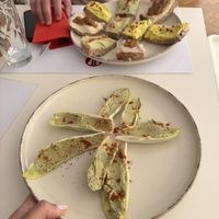 Big dry bread and endive with a lot of hummus   at Vegasmo in Brasov