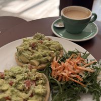 Guacamole bagel and oat milk flat whitee  at Bagel Coffee Culture in Berlin