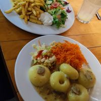 lentil fish (above) and dumplings with mushroom sauce (below) at Vega in Wroclaw