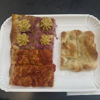 Vegan pizza slices   at Farinado in Ancona