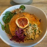 Bowl from the cabinet - pumpkin, tofu scramble, rice, quinoa and other veggies hidden underneath - yum! at Surfcoast Wholefoods in Torquay