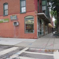 on corner at Pizza Aroma in Ithaca