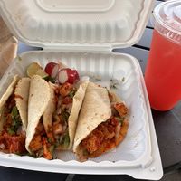 Tofu chorizo tacos Mexicano style and a watermelon Agua Fresca to go.  at El Pueblo Taqueria 2 in Cape May