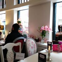 seating with cakes at Barbarella Cafe in Aachen