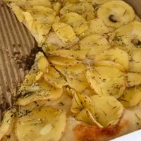 Fredo vegan pizza: flavorless and dry slices of potato on dough  at Pizzaiolo in North York