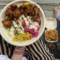 cauliflower on salad with fries at Taïm - Nolita in New York City