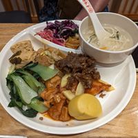 Buffet plate with various dishes at Sumanxiang Vegetarian Cafeteria Suyan - 素满香素食自助餐厅·素宴 民乐园店 in Xian