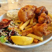 Vegan Fish and Chips with French Fries, Side Salad and vegan Remoulade at Fangfrisch in Luebeck