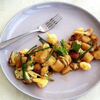 Potato and lemon myrtle gnocchi with saute cauliflower jarlsberg crisps and parmesan custard at Abundance Lifestyle and Garden in Sancrox
