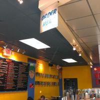 Menu on the wall. Colorful place at Ike's in Salinas