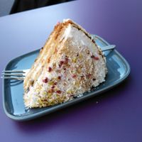 In love with this multilayered coconut cake. It was absolutely delicious at Aux Deux Portes Cafe in Geneva