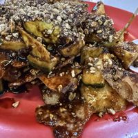 Vegetarian Rojak with turnip, green (semi-ripe) mango, cucumber, pineapple, crackers with savoury black rojak sauce and peanuts   at Chen Ee Vegetarian Food 正一素食 in Ipoh