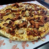 Vegan meatfeast pizza with added mushrooms at Veggie Master in Birmingham