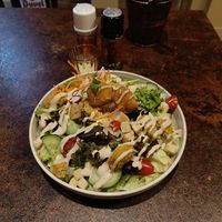Salad with cheese croquettes at OhMA Gent in Ghent