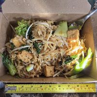 Pad thai, specify vegan, with tofu.  Generous carryout portion at Baan Thai Bistro in Indianapolis