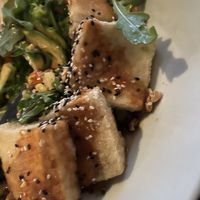 Pan fried tofu with stir fried veggies.  at Montarra in Algonquin