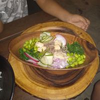 This is a toddlers hand, the bowl has a length of 20 cm . at Reef Bar & Restaurant in Koh Samet