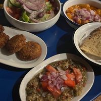Greek salad (without feta cheese), beans, chickpea burgers, eggplant saladd  at The Mills - Παραδοσιακό καφενείο "οι μύλοι" in Astypalaia