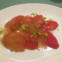 tomato carpaccio, lime zest and vanilla dressing at L'Elephant Vert in Luang Prabang