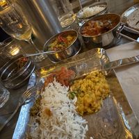 Cardamom rice, tarka dahl, bombay potato, chapatis & vegan wine  at Mowgli in Edinburgh