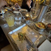 Bombay mix style side with crispy bits and peanuts. Delicious and really fragrantly spiced. Vegan Pinot Grigio   at Mowgli in Edinburgh