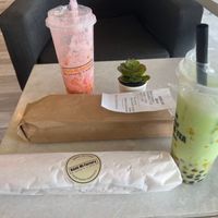 Honeydew milk tea, watermelon milk tea, and tofu sandwich. All vegan. Large sizes.  at Banh Mi Factory in Tampa
